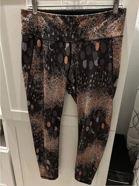 H&M Black and Orange Patterned Leggings